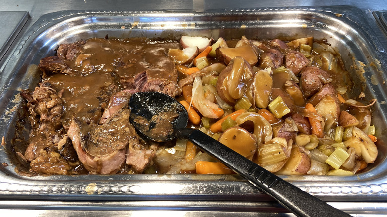 pot roast in metal tray