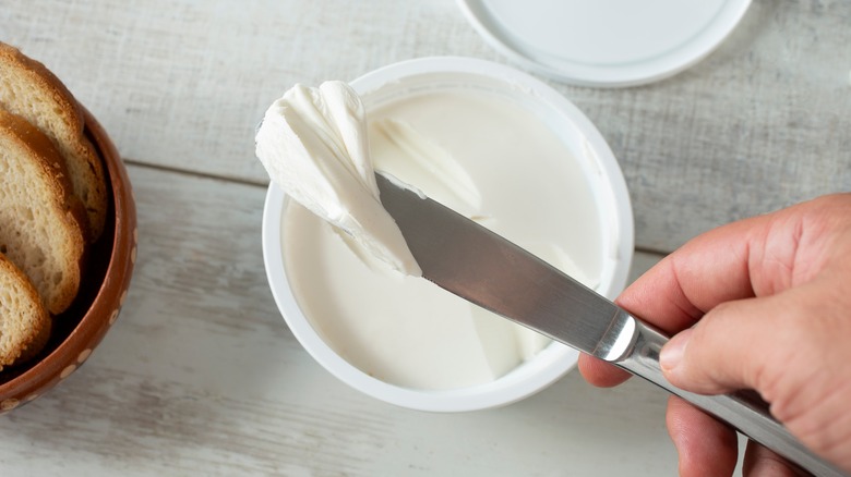 cream cheese on knife