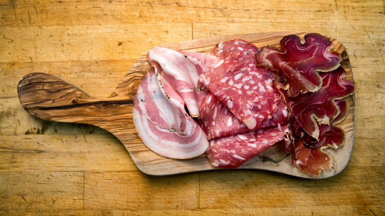 cured meats on cutting board