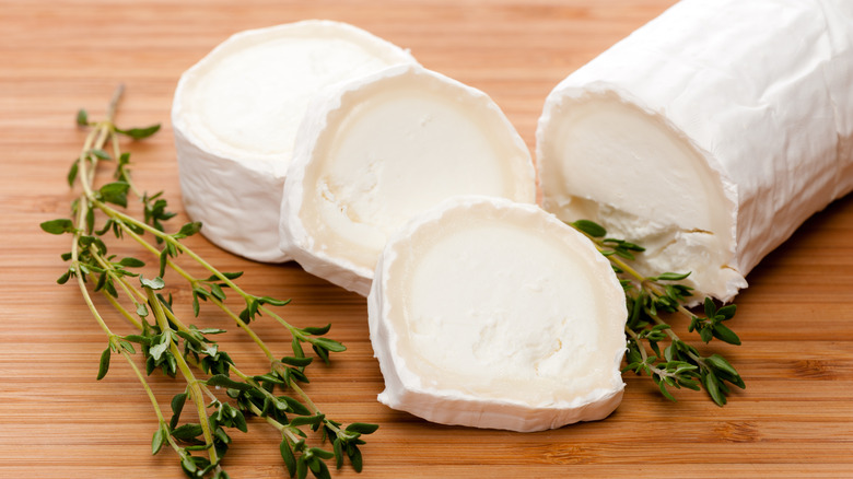 goat cheese on cutting board