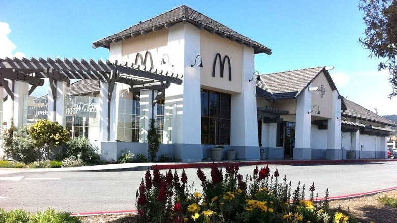 Street view of a McDonald's location with black arches