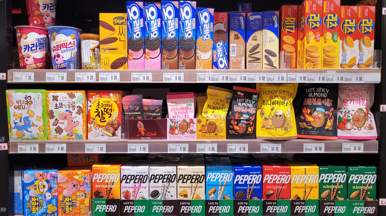 shelf full of korean snacks on display