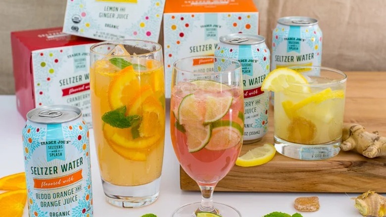 Trader Joe's Seltzer with a Splash in boxes, bottles, and glasses