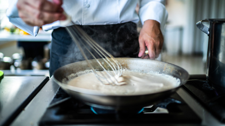 Chef making béchamel sauce