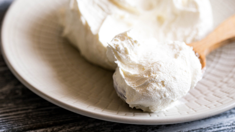 Mascarpone on plate with spoon