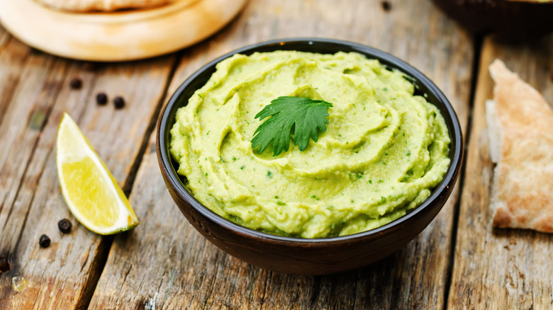 avocado hummus with pita bread