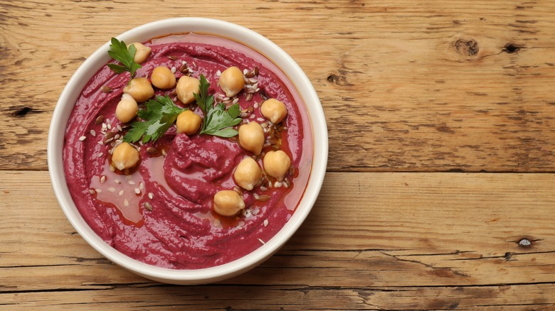 Roasted beet hummus on wood