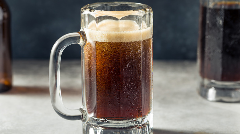 whiskey root beer in a glass mug