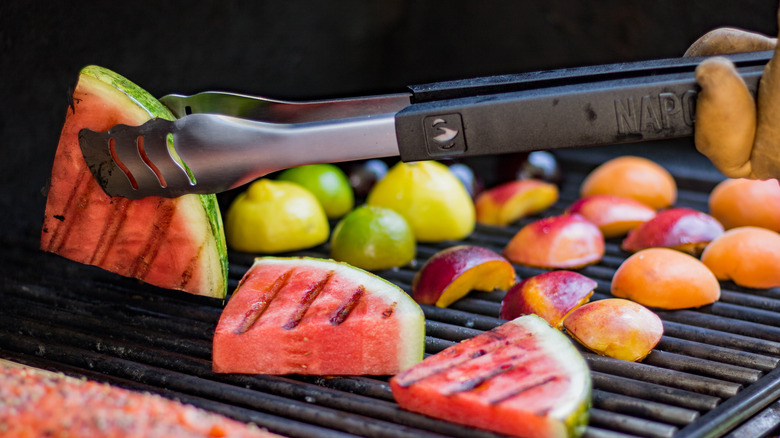 Assorted fruits on grill