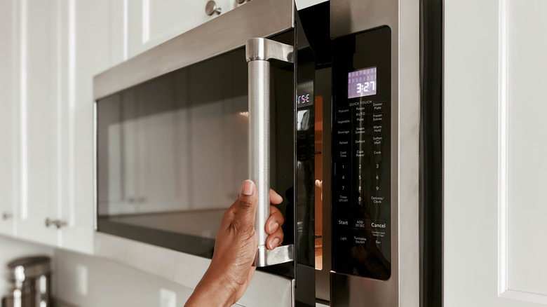 hand opening microwave door