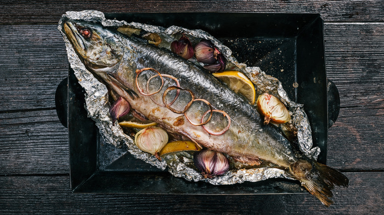 whole baked salmon with lemon and onion