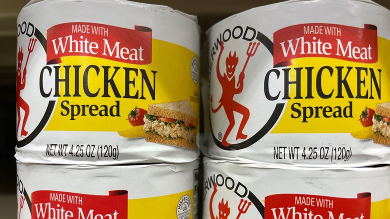 Cans of Underwood chicken spread in store