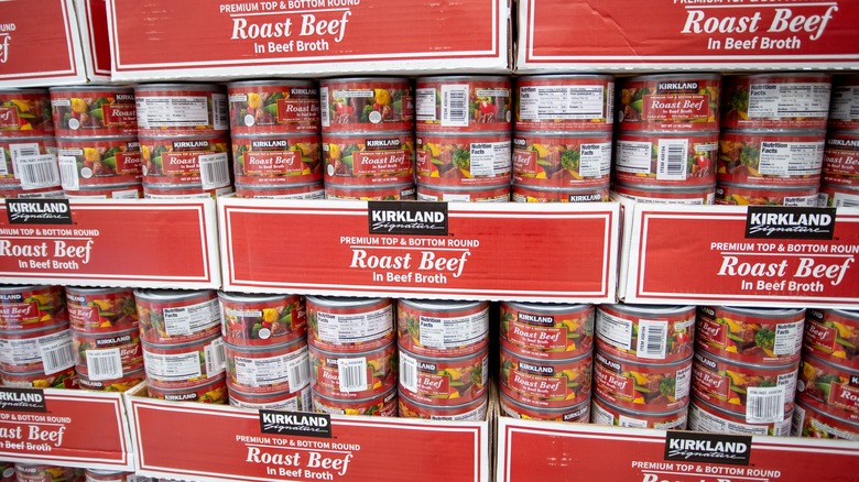 Stacks of cans of Kirkland Signature roast beef in cans