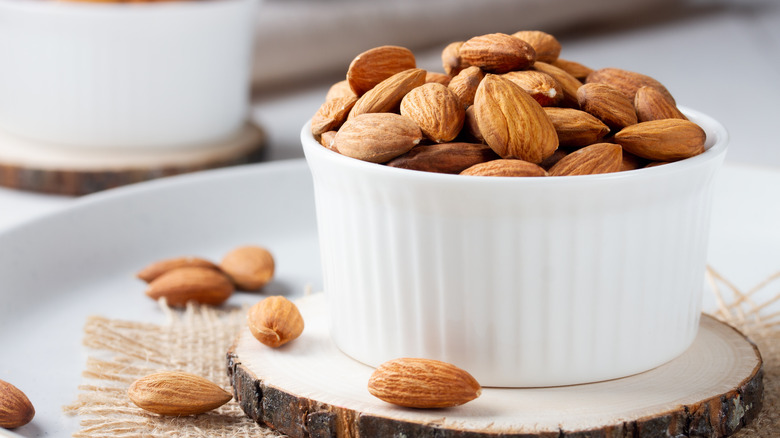 White bowl of almonds