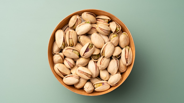 Bowl of pistachios in their shells