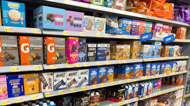 Boxes of protein bars on Walmart shelves