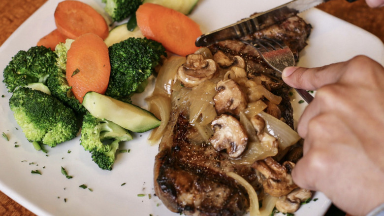 Sizzler steak, mushrooms