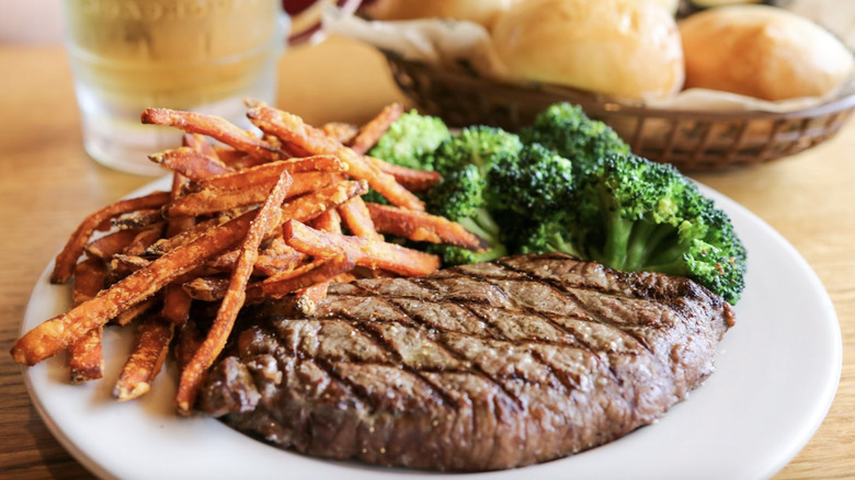 Logan's Roadhouse steak with sides