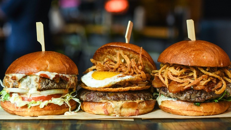 three burgers from Hopdoddy Burger Bar