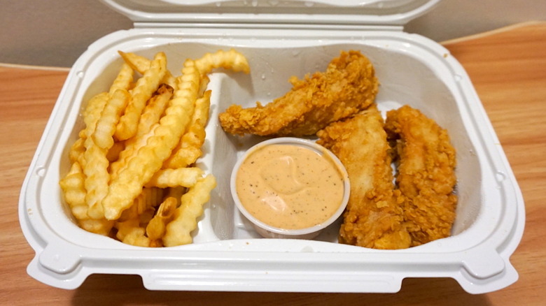 Raising Cane's chicken tenders with fries