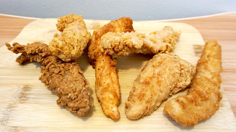 Assorted chicken tenders on board