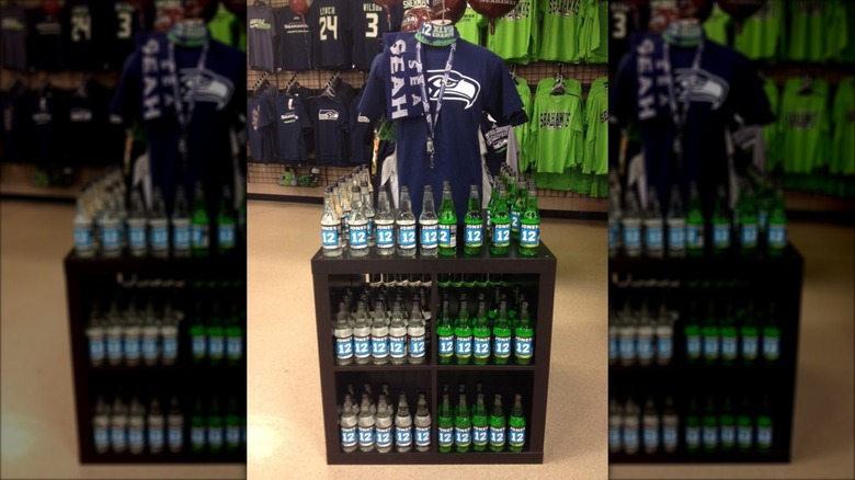 Seahawks shirts behind a display of Jones Soda