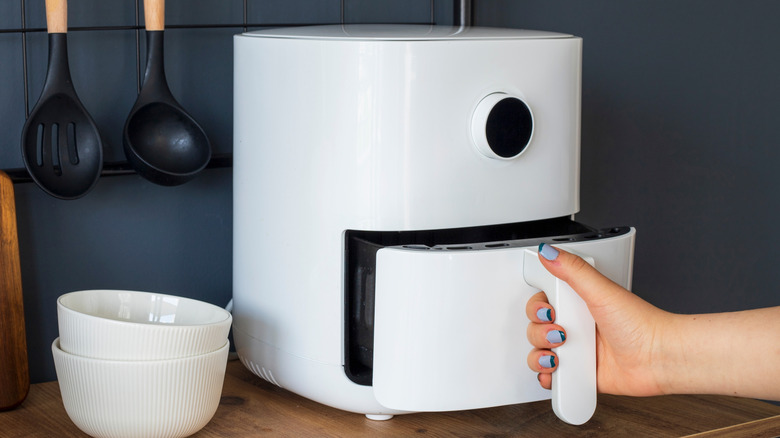 white air fryer and bowls