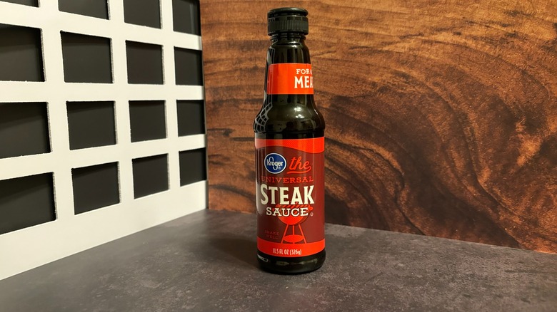 Bottle of Kroger Universal Steak Sauce on grey counter