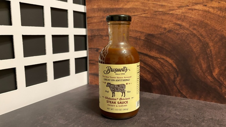 Bottle of Braswell Vidalia Onion Steak Sauce on grey counter