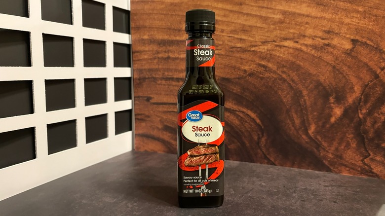 Bottle of Great Value Steak Sauce on grey counter