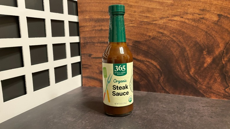 Bottle of Whole Foods 365 Organic Steak Sauce on grey counter