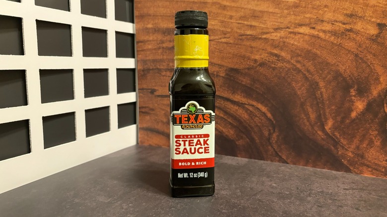 Bottle of Texas Roadhouse Classic Steak Sauce on grey counter