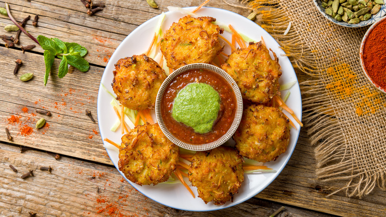 Vegetable pakoras with dipping sauces