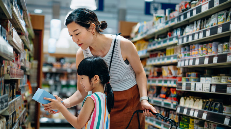 People shopping in grocery store