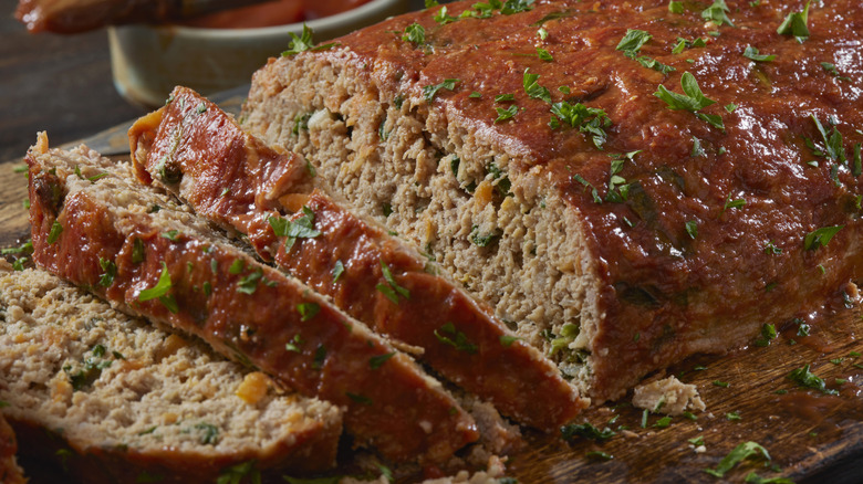 A close-up of sliced meatloaf