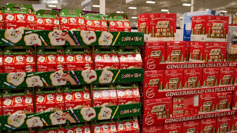 Stacked cookie decorating and gingerbread house kits at Costco