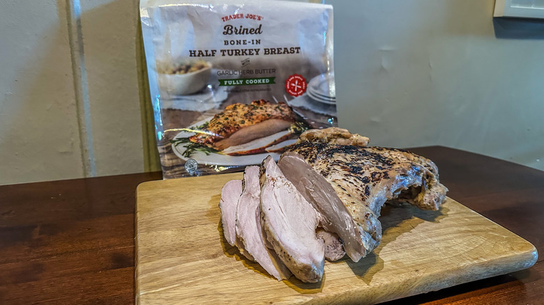 brined bone-in half turkey breast from Trader Joe's on cutting board