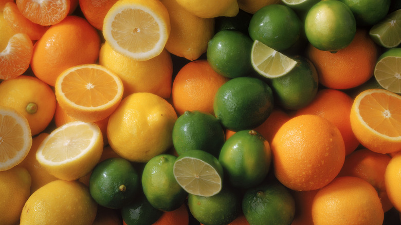 A large pile of lemons, limes, and oranges