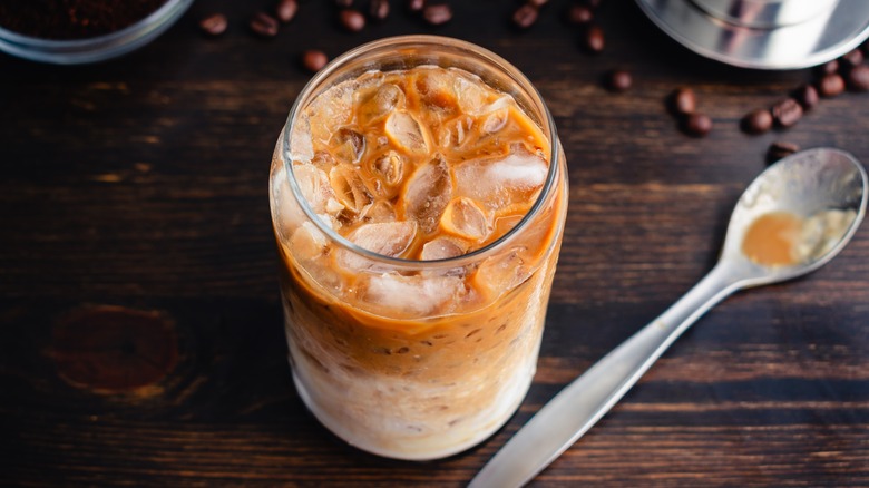 Glass of coffee with condensed milk