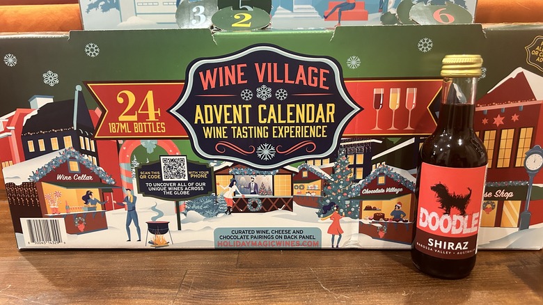 A bottle of Australian Shiraz in front of Aldi's Advent Calendar