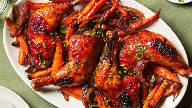 Glazed chicken and carrots on platter