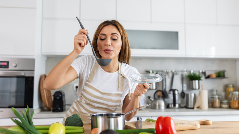 Person cooking in kitchen