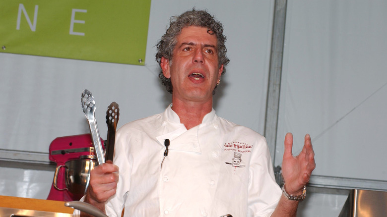 Anthony Bourdain speaking in Les Halles chef outfit