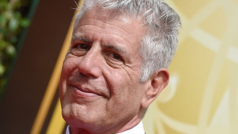 Anthony Bourdain smiling outside