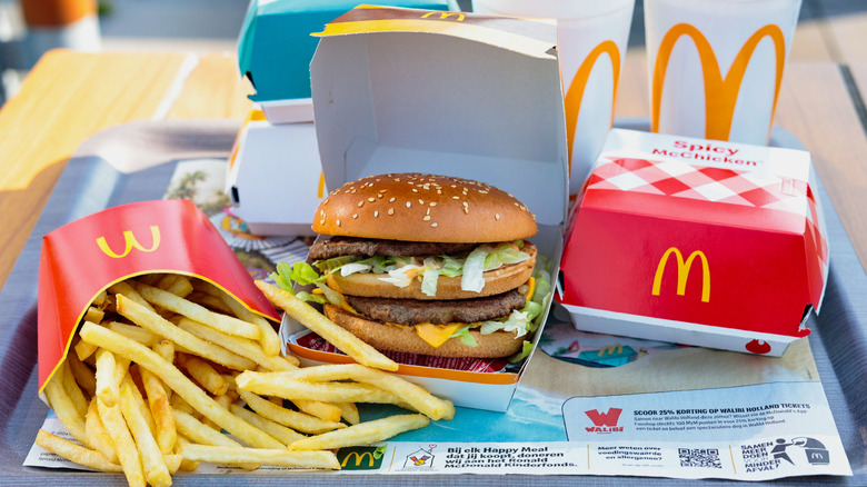 a tray of food from McDonald's including burger and fries