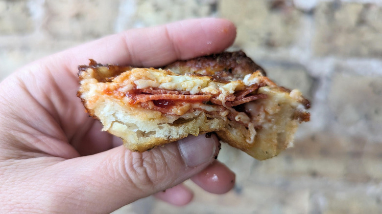 half-eaten pepperoni Crazy Puff