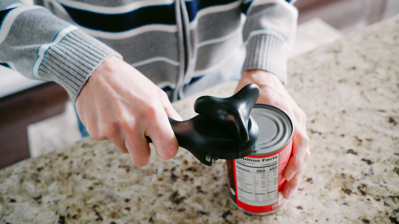 can of food being opened