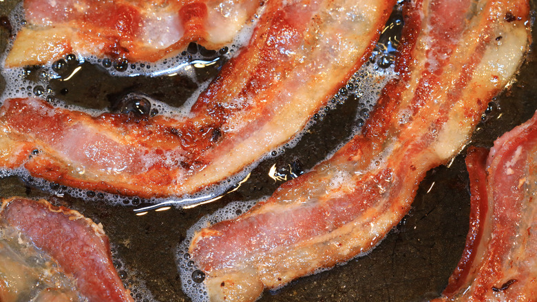 Bacon cooking in a pan