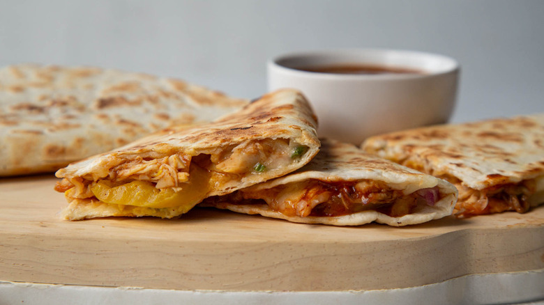 quesadillas on a wooden board