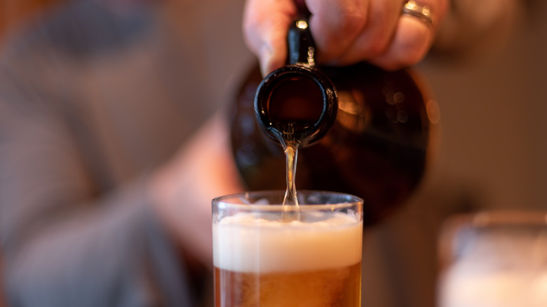 pouring beer from growler